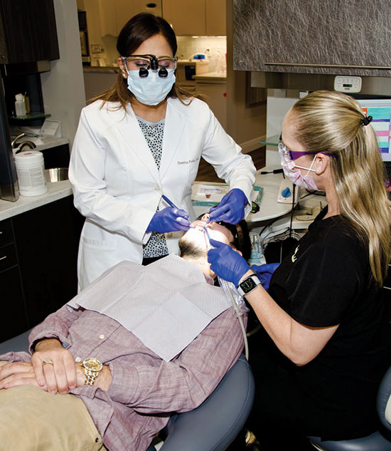 Dr. Seema Amin treating a patient